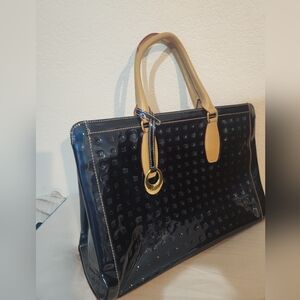 Chic Black and Tan Structured Tote with Gold Hardware